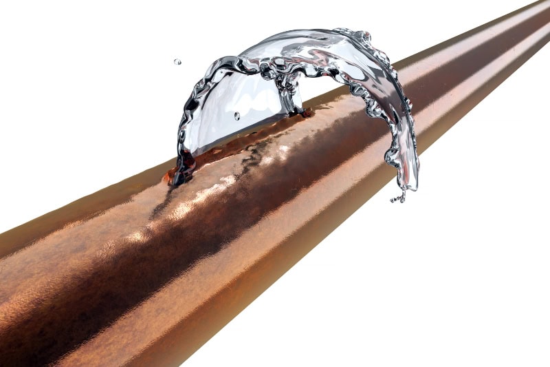How to Prevent Frozen or Burst Pipes This Winter. Broken pipe is leaking water.